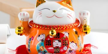 MANEKI NEKO Biểu Tượng May Mắn